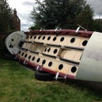 Sanding the boat outside - a dusty job!